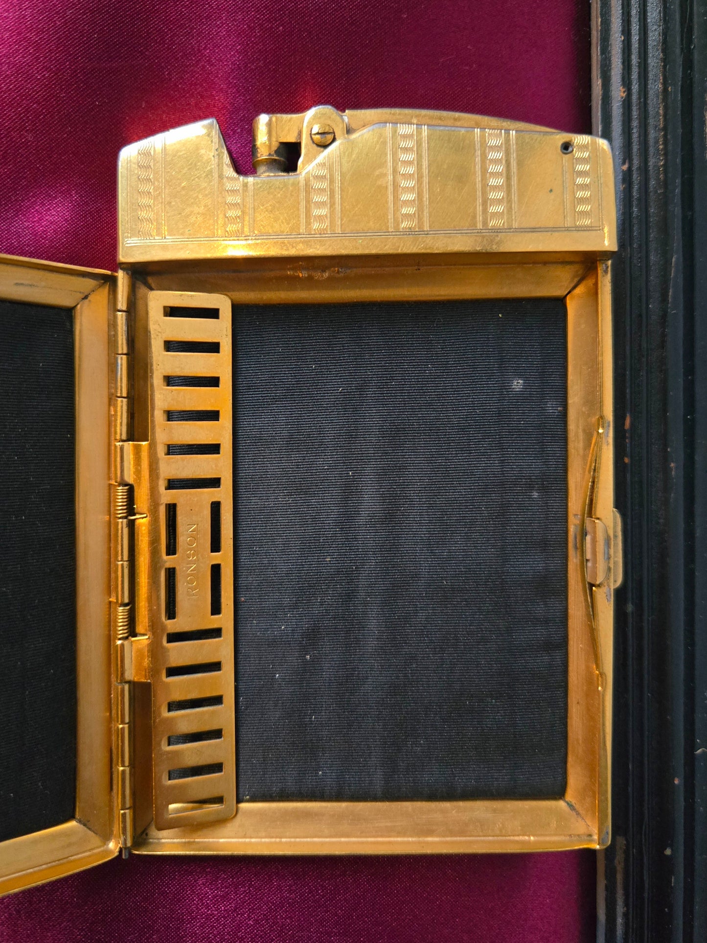 1930s Ronson Gold and Black Leather Lighter Case
