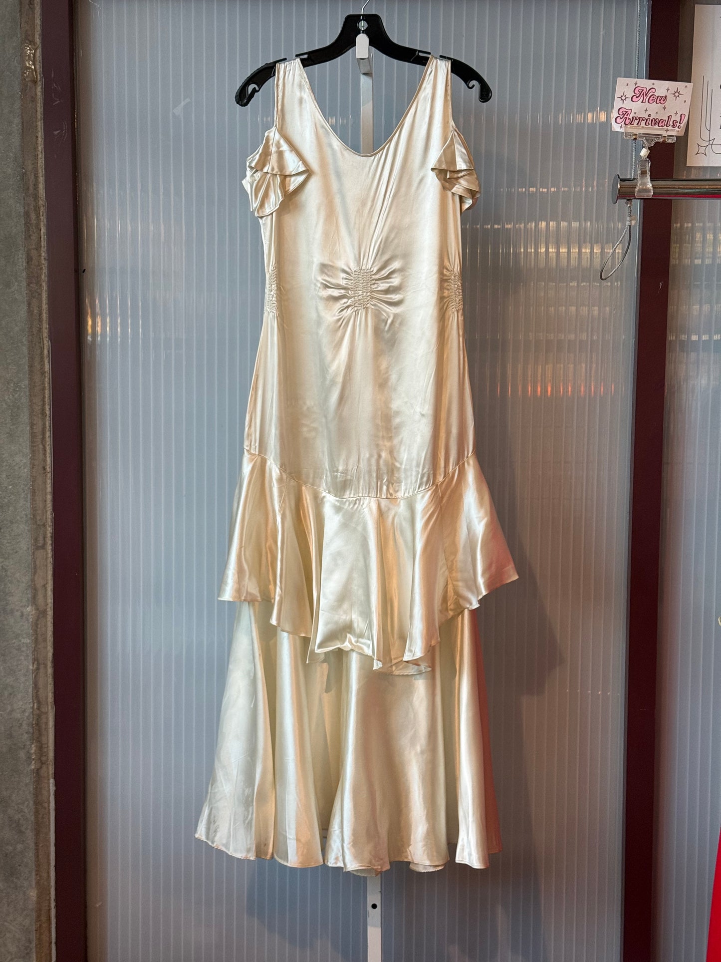 1930s Cream Silk Gown w/ Drop Waist Ruffle & Off-Shoulder sleeves.